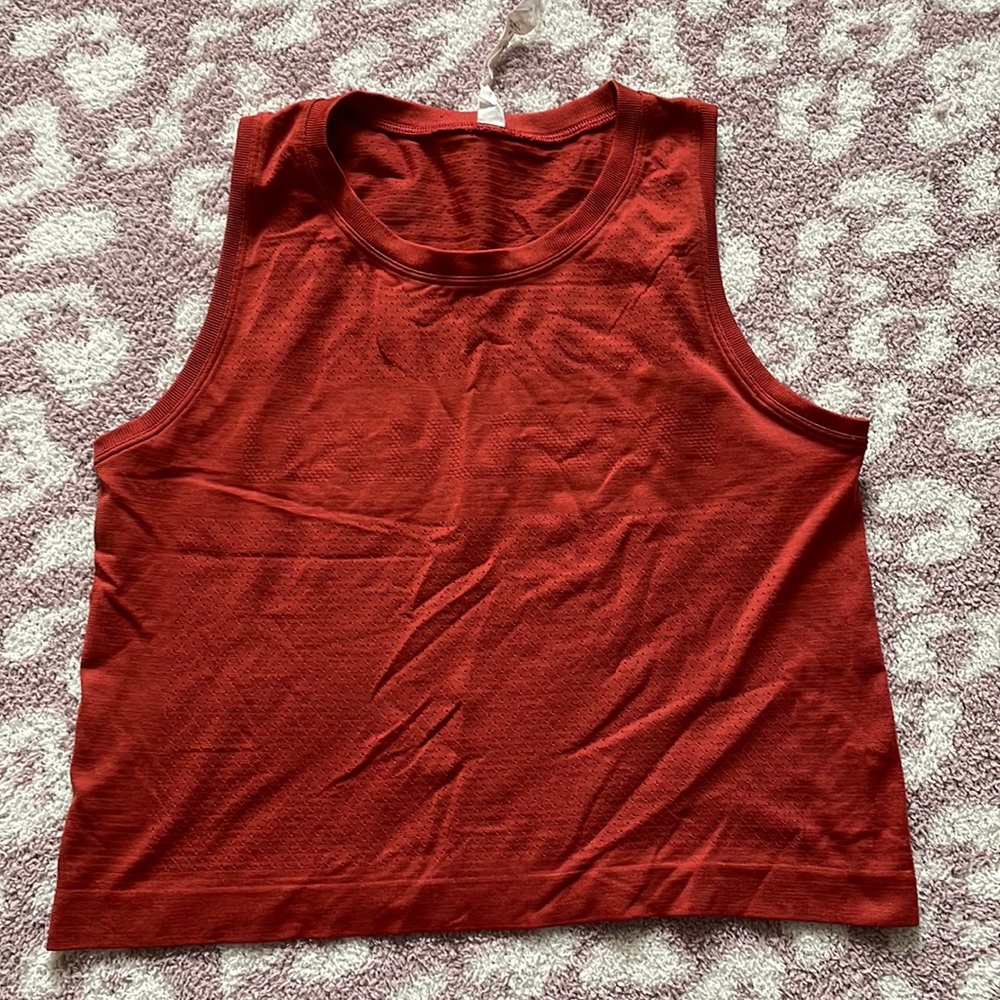 burnt orange lululemon mesh muscle tank size 4